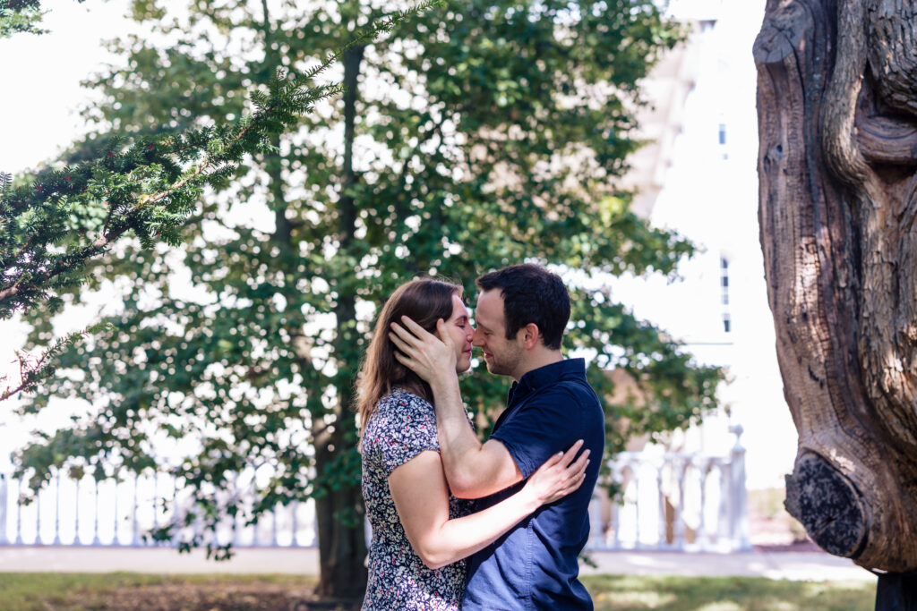 Emotional moment of a couple exchanging rings during a mutual proposal in Washington DC