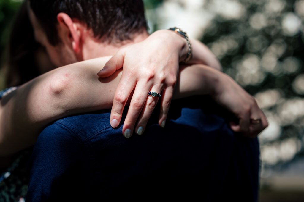 Tearful and joyful reaction during a surprise mutual proposal in DC